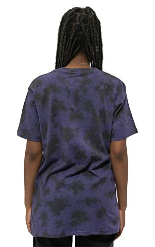 Back view of person wearing a blue and black tie-dye t-shirt