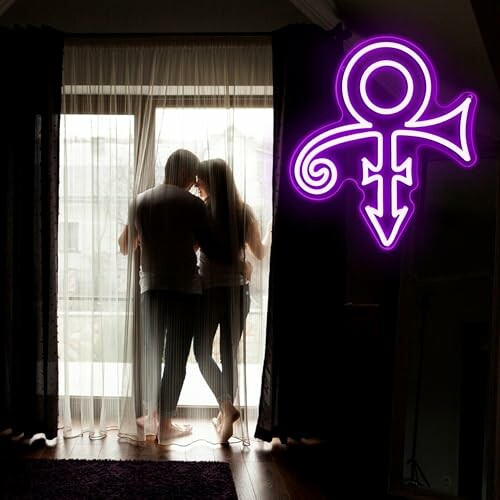 Silhouette of a couple standing by a window with a neon symbol, showcasing the sign's ambient lighting.