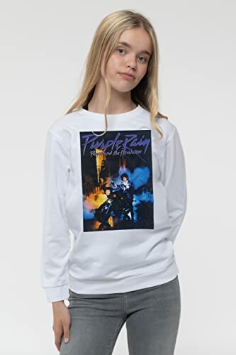 Girl wearing a white sweatshirt with a colorful graphic design.