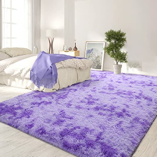 Modern bedroom with a purple rug, bed, and potted plant.