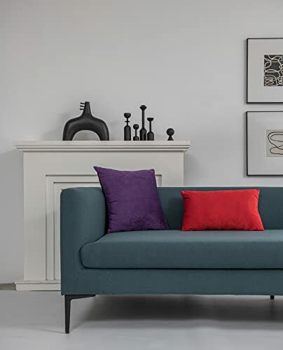 Contemporary living room with teal sofa, purple and red cushions, and minimalist decor showcasing the pillow arrangement