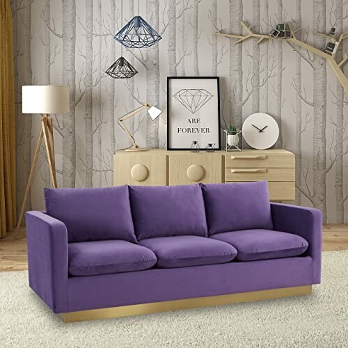 Modern living room with purple sofa, wooden sideboard, and geometric decor.