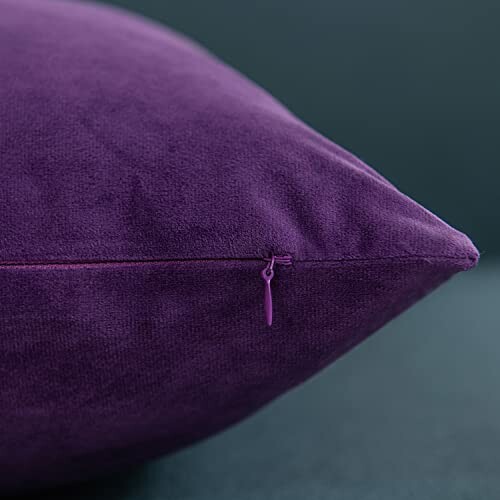 Close-up of a purple cushion with a zipper showcasing its quality