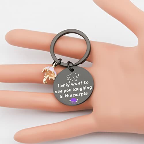 Keychain with quote 'I only want to see you laughing in the purple'