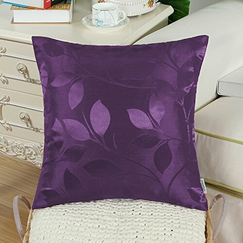 Purple cushion with leaf pattern on chair