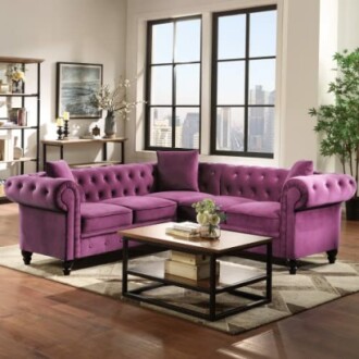 Purple sectional sofa in modern living room with large windows