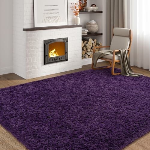 Modern living room with purple rug, fireplace, and cozy chair.