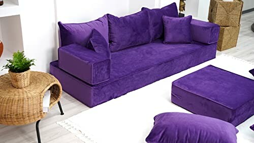 Purple sofa set with cushions and matching ottoman