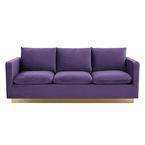 Purple sofa with gold base.