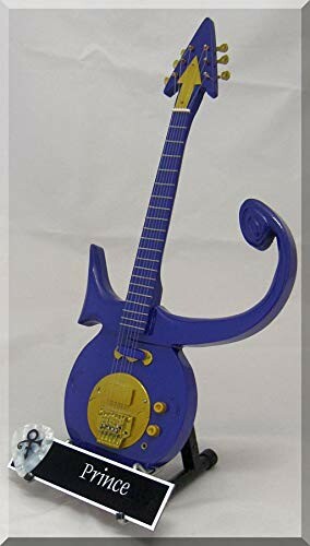 Purple guitar with unique design and symbol shape