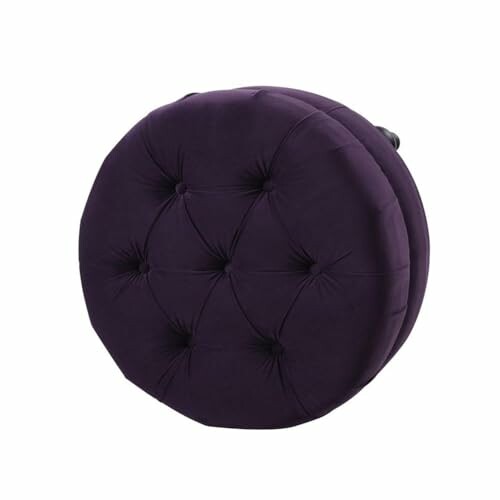 Purple tufted round pillow