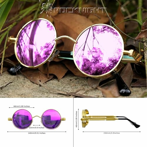 Round vintage sunglasses with purple lenses on grass.